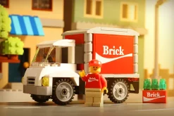 The Brick Show Shop Custom Brick Soda Delivery Truck with Minifigure made using LEGO parts