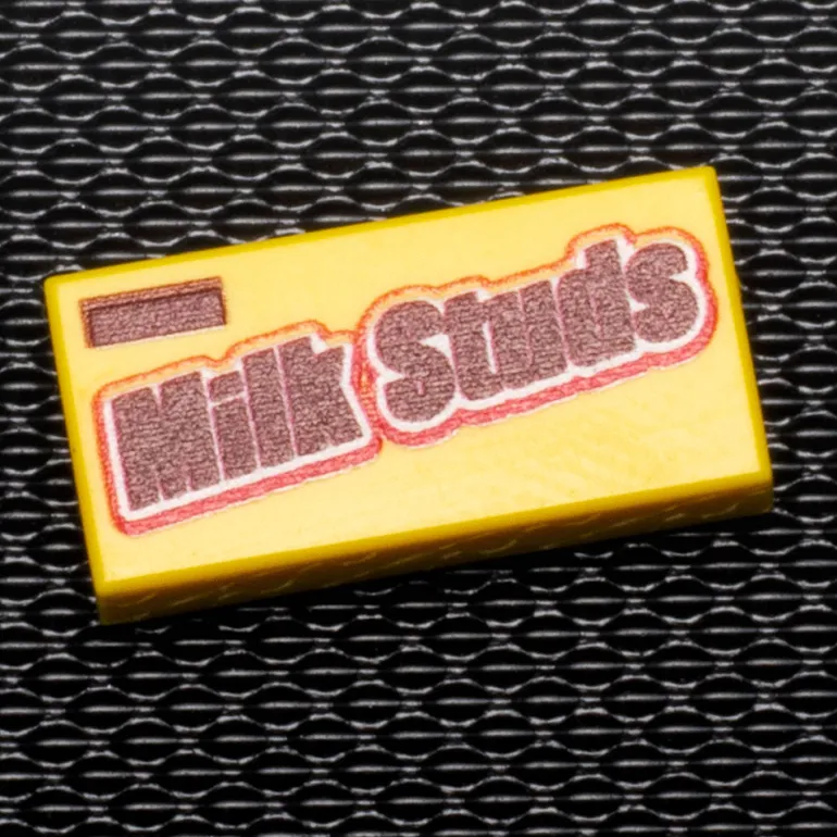 The Brick Show Shop Milk Studs Custom Printed 1x2 Tile made using LEGO parts - B3 Customs