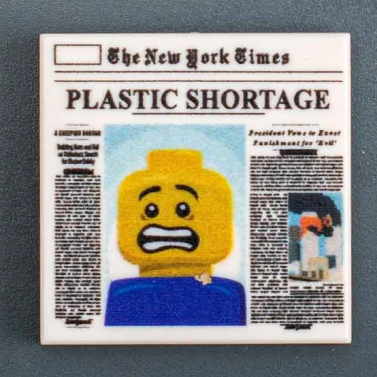 The Brick Show Shop Plastic Shortage, Newspaper - B3 Customs Part (2x2 Tile)