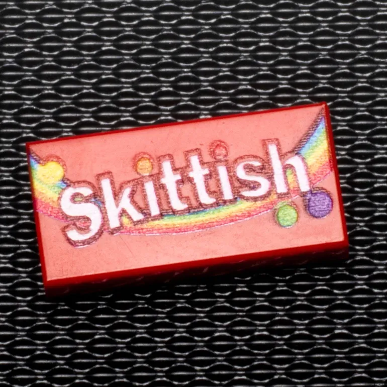 The Brick Show Shop Skittish - Custom Printed Candy 1x2 Tile made using LEGO part